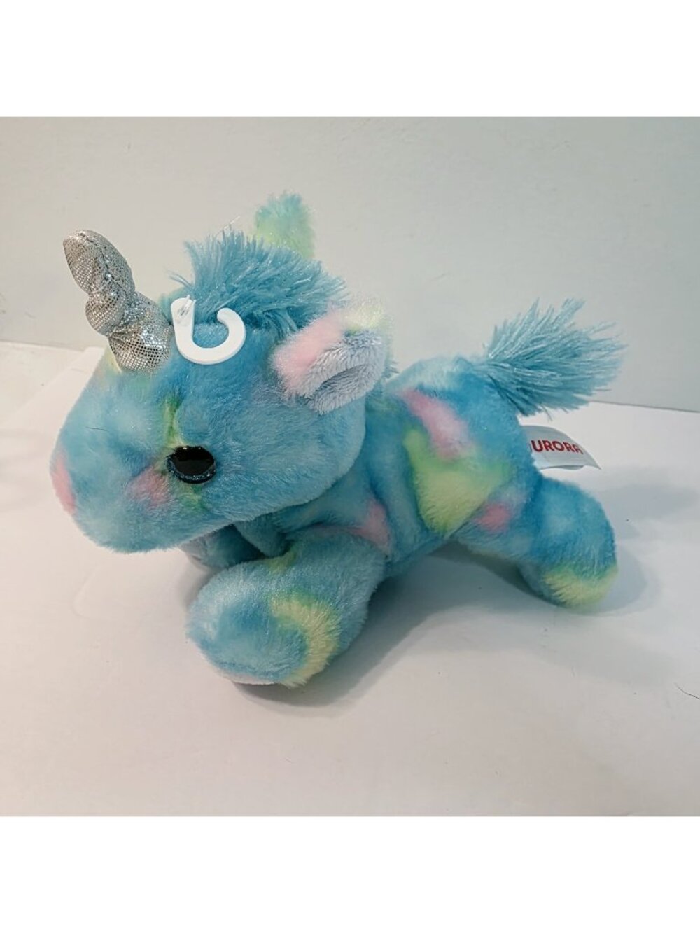 Aurora Multicolor Rainbow Teal Green Color Spotted Laying Down Unicorn 2021
